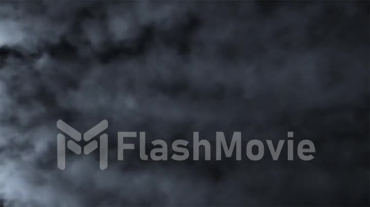 Fast moving puffs of smoke on an isolated black background