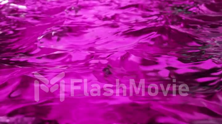 Pure purple water in the pool with light reflections