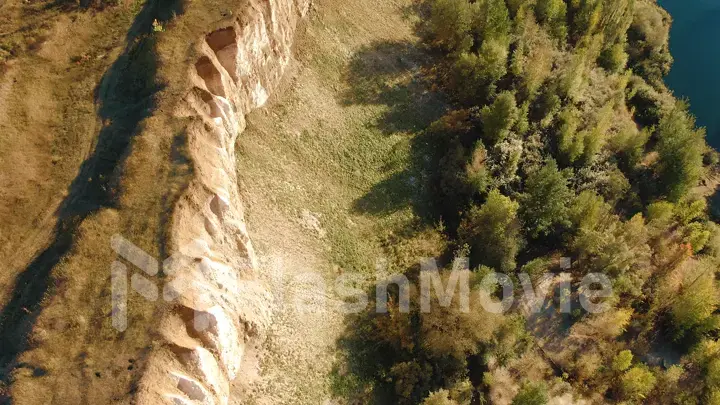 Aerial footage of chalk mountains and nature, a lake and a beautiful landscape