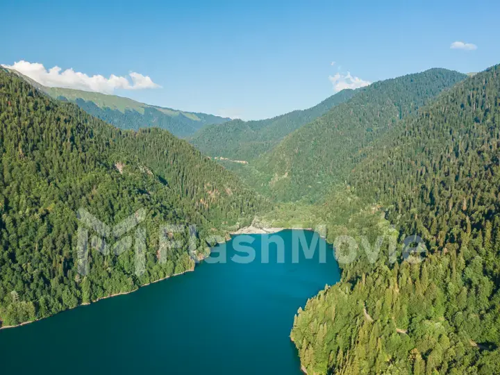 Stunning mountain landscape with a crystal clear blue lake. Aerial view