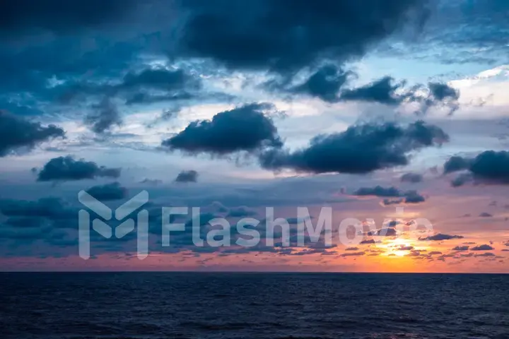 Magnificent sea sunset with clouds in the sky