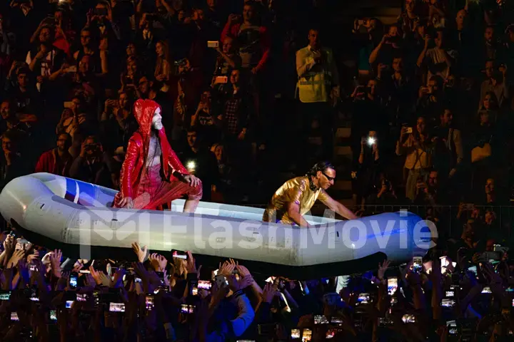 MOSCOW, RUSSIA - JULY 29, 2019: Rammstein group fire concert at Luzhniki Stadium. Crowds of fans gathered at a rock concert of their favorite metal band.