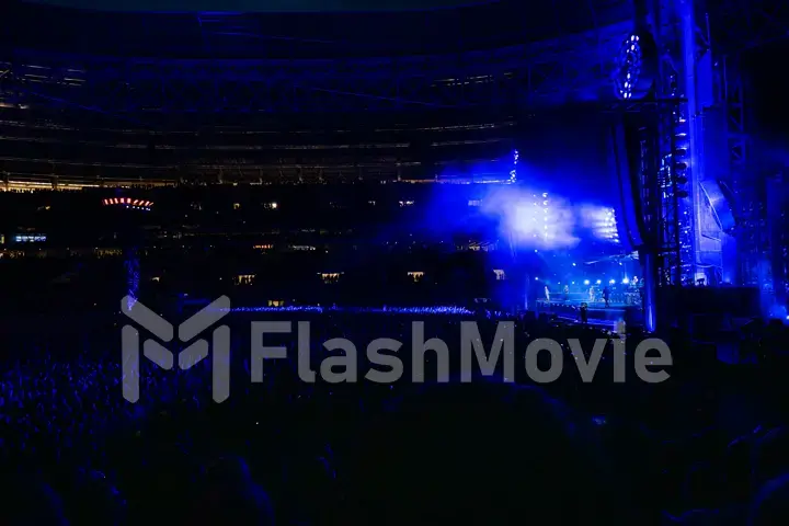 MOSCOW, RUSSIA - JULY 29, 2019: Rammstein group fire concert at Luzhniki Stadium. Crowds of fans gathered at a rock concert of their favorite metal band.