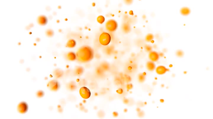 Explosion of orange juice in slow motion on isolated white background