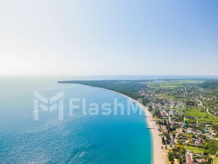 Soft wave of blue ocean on sandy beach. Background. Aerial view