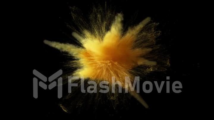 Super slow motion of gold yellow colored powder explosion