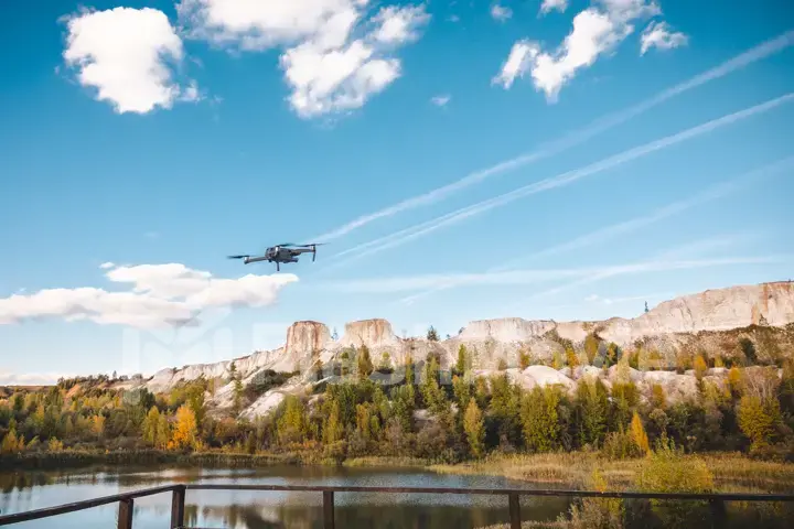 Aerial footage of chalk mountains and nature, a lake and a beautiful landscape