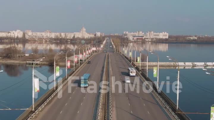4k Aerial view of traffic of cars on the bridge in a populated city