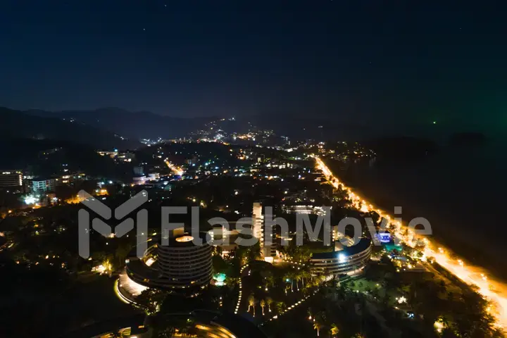 Aerial photography top see to karon beach in night time, phuket Thailand