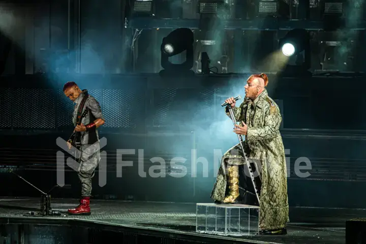 MOSCOW, RUSSIA - JULY 29, 2019: Rammstein group fire concert at Luzhniki Stadium. Crowds of fans gathered at a rock concert of their favorite metal band.