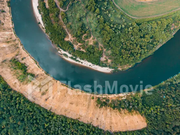 aerial landscape of winding river in green field, top view of beautiful nature texture from drone