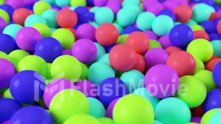 Colorful 4k 3D animation from a pile of abstract spheres and balls rolling and falling from top to bottom.
