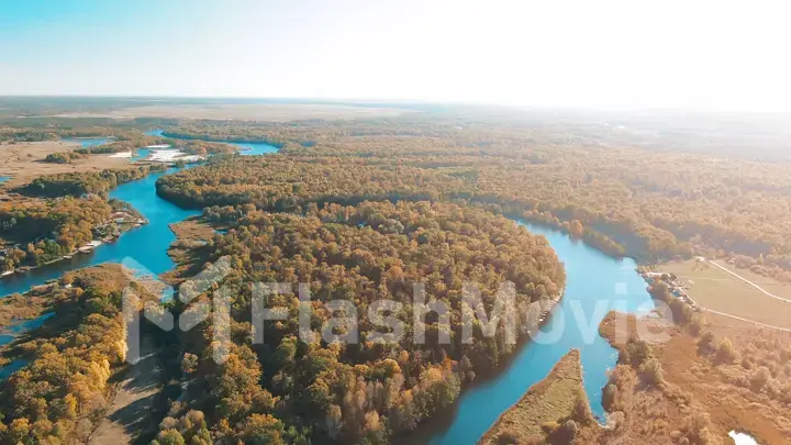 Cinematic aerial view, flight over a beautiful meandering river, panoramic view from a great height