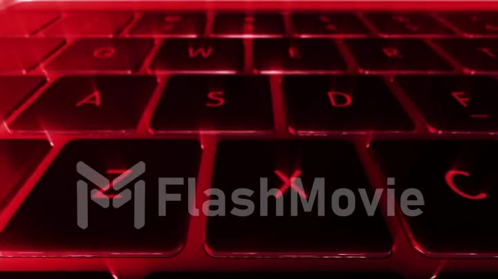 Computer keyboard with red backlight closeup