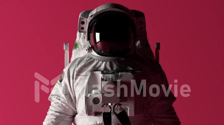 Astronaut's head close-up on a pink isolated background with changing lighting. Chroma key. Helmet. 3D animation