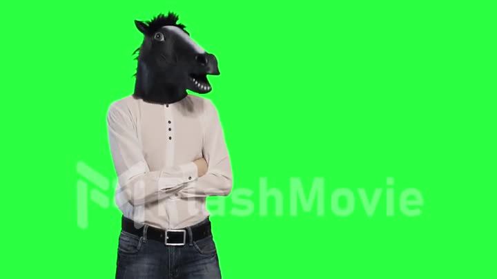 A man in a horse's mask nods his head dancing chromakey