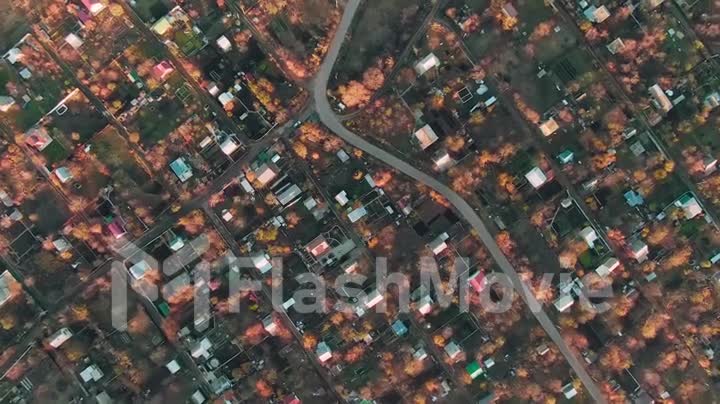 Aerial view Rotation of the camera over a big city with houses and an expensive day on an autumn sunny day