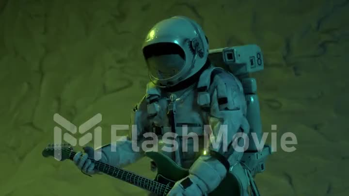 Astronaut musician plays the guitar on the background of a limestone wall. Green neon lighting. Universe Disco Party.