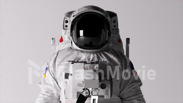 The head of an astronaut on a white background. Lighting is changing. Helmet. Dark and light. Shadows on the wall.