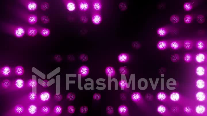 Bright floodlights flashing. Purple. Set of lights turning on and off.