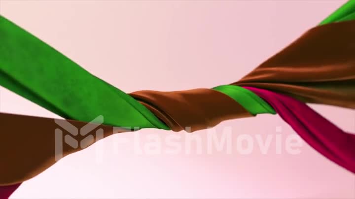 Velvet ribbons of different colors are tightly twisted together on an abstract background. Green, brown, purple color.