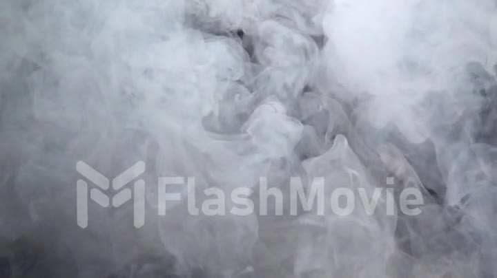 Beautiful dense smoke puffs in slow motion