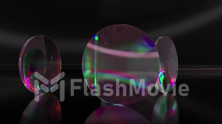 Colorful translucent glass blocks spin and rotate on black background lenses. 3d animation of seamless loop